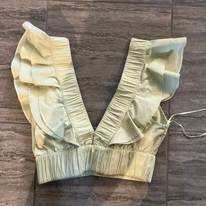 light green cropped top